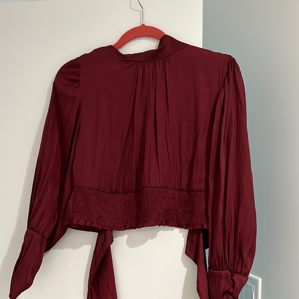 Never worn L open back shirt
